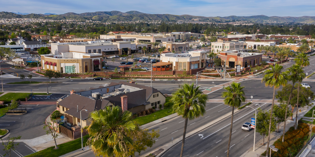 Aerial shot of intersection in Yorba Linda, Calif. Street, trees, and buildings.